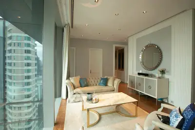 Luxurious living room with elegant decor and stunning city view