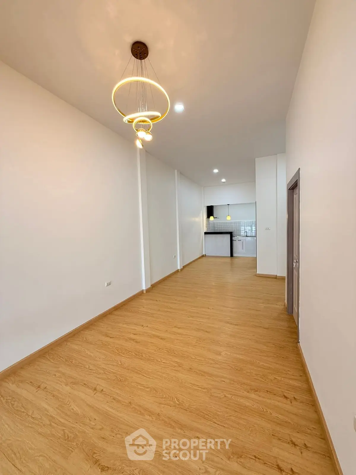 Spacious modern apartment with open layout and elegant lighting