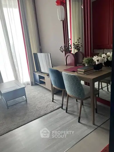 Stylish modern living room with elegant dining area and natural light