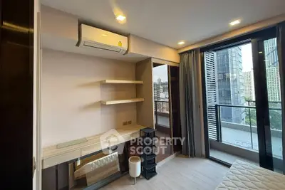 Modern bedroom with balcony view in urban high-rise apartment