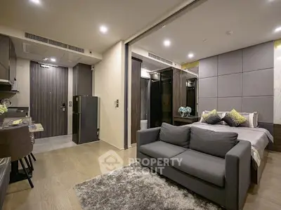 Modern studio apartment with open layout and stylish decor.