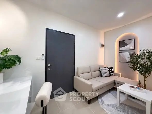 Modern living room with stylish decor and cozy seating area