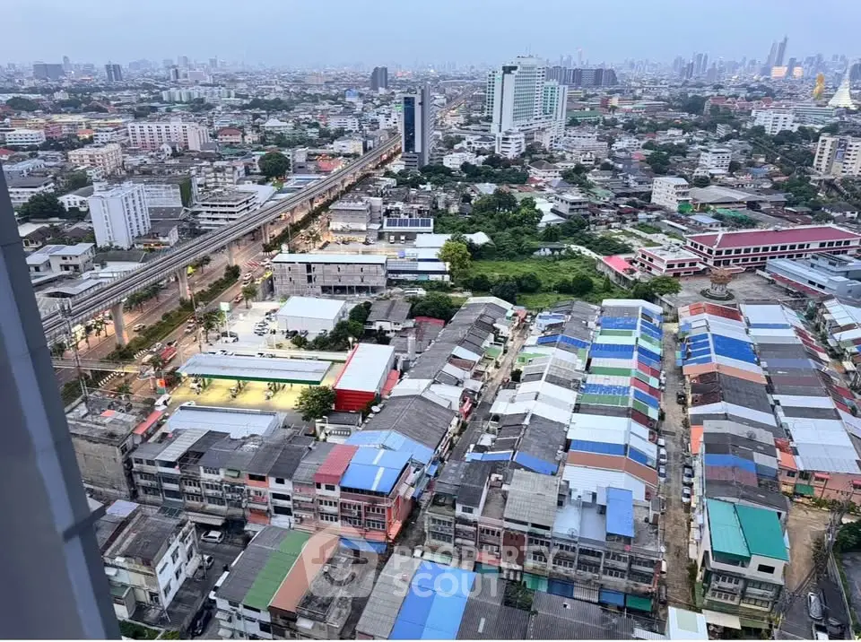 Stunning cityscape view from high-rise building showcasing vibrant urban landscape.