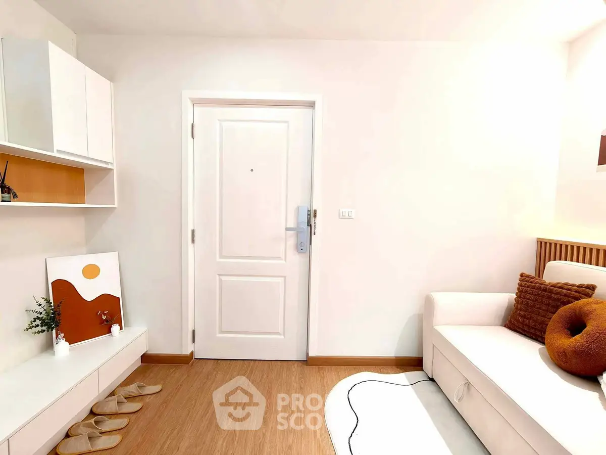 Modern living room with white sofa and minimalist decor