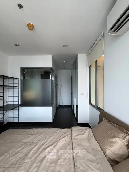 Modern bedroom with sleek design and air conditioning