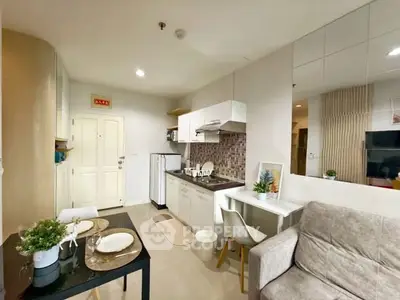 Modern open-layout kitchen and living area with stylish decor