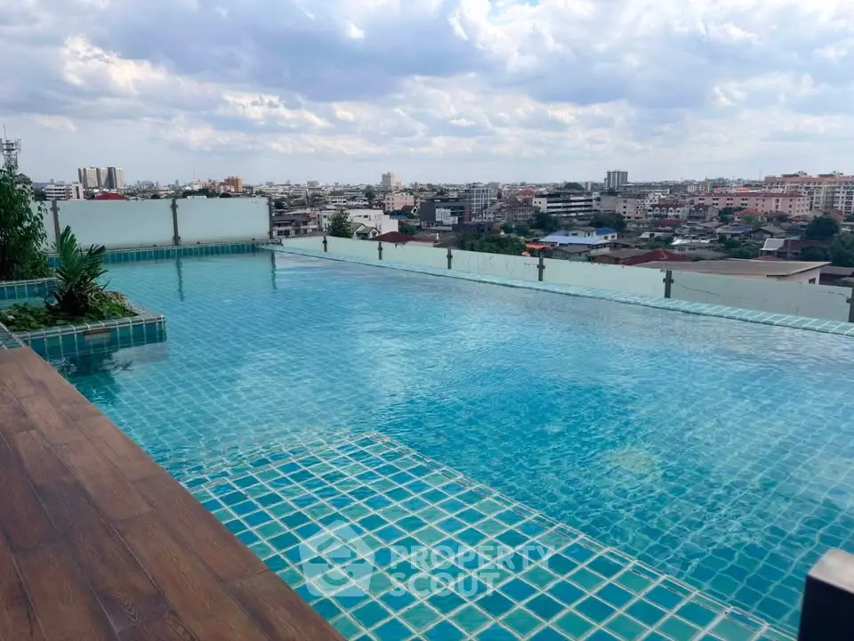 Stunning rooftop infinity pool with panoramic city views, perfect for luxury living.