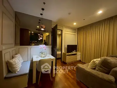 Cozy living room with elegant dining area and plush seating, perfect for modern urban living.