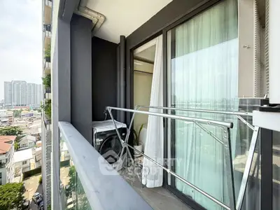 Modern apartment balcony with city view and laundry area