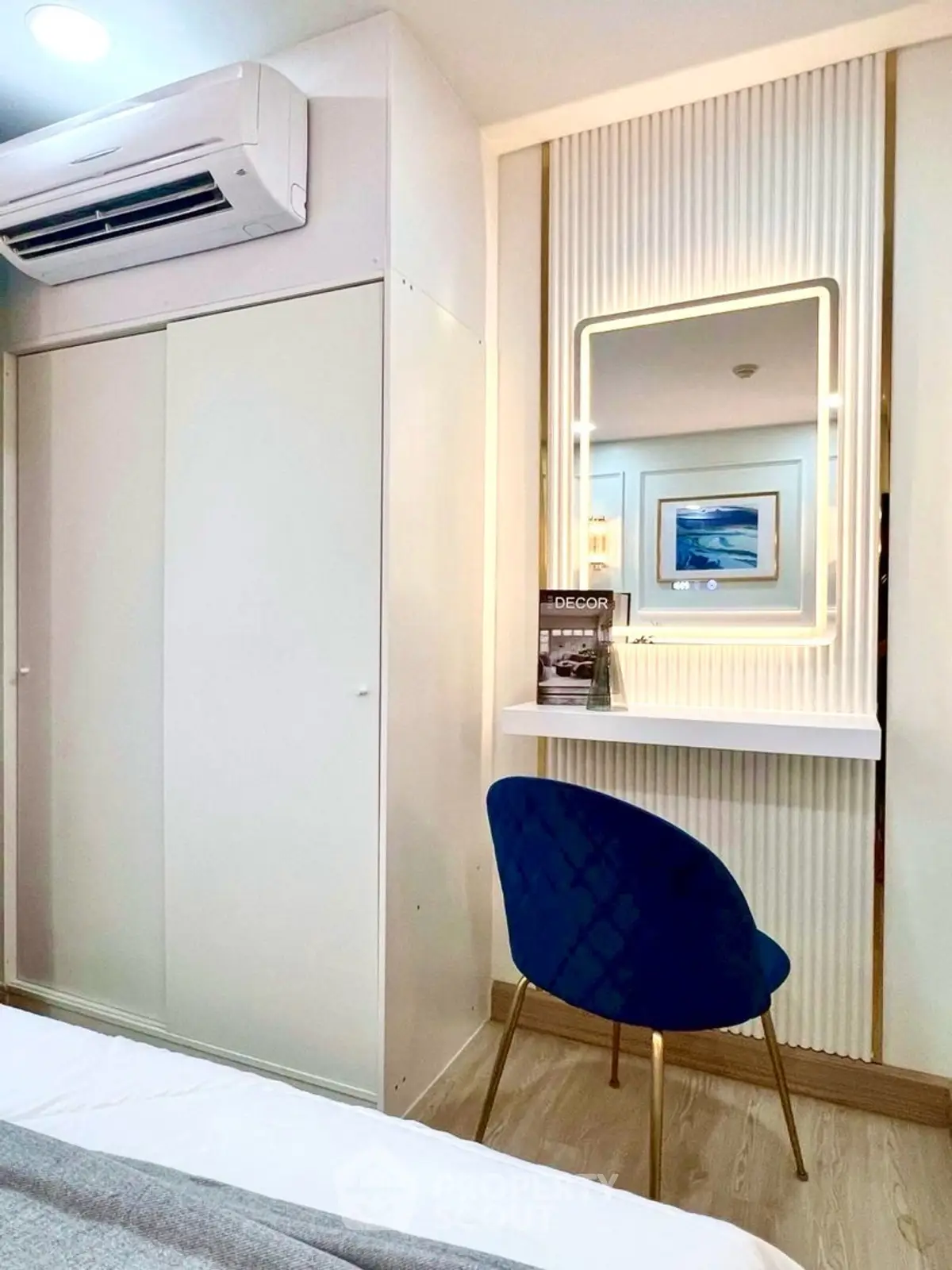 Stylish bedroom with modern decor and elegant vanity area