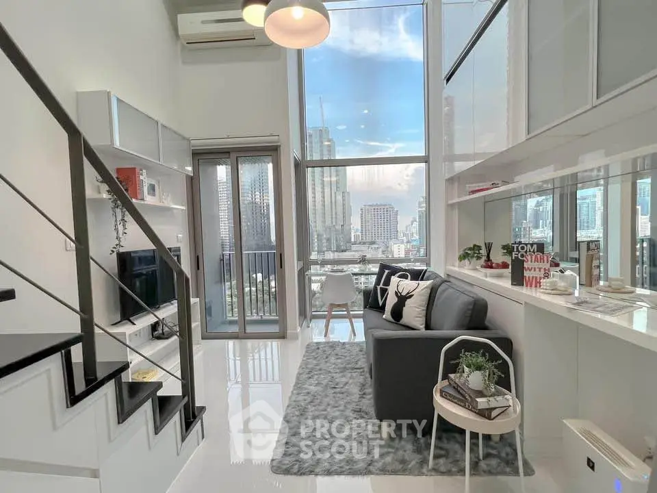 Modern living room with high ceilings and city view, featuring sleek furniture and stylish decor.