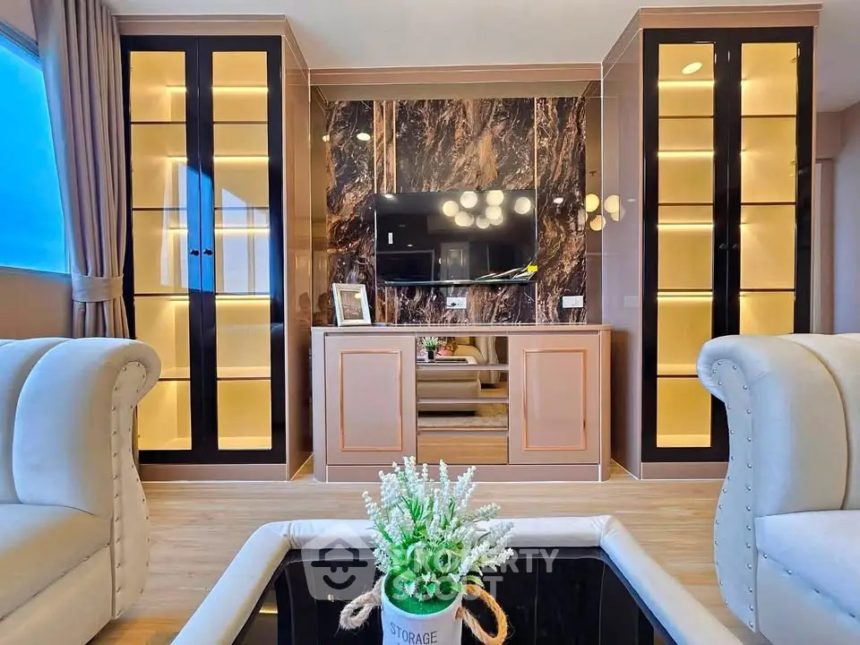 Luxurious living room with elegant display cabinets and modern decor
