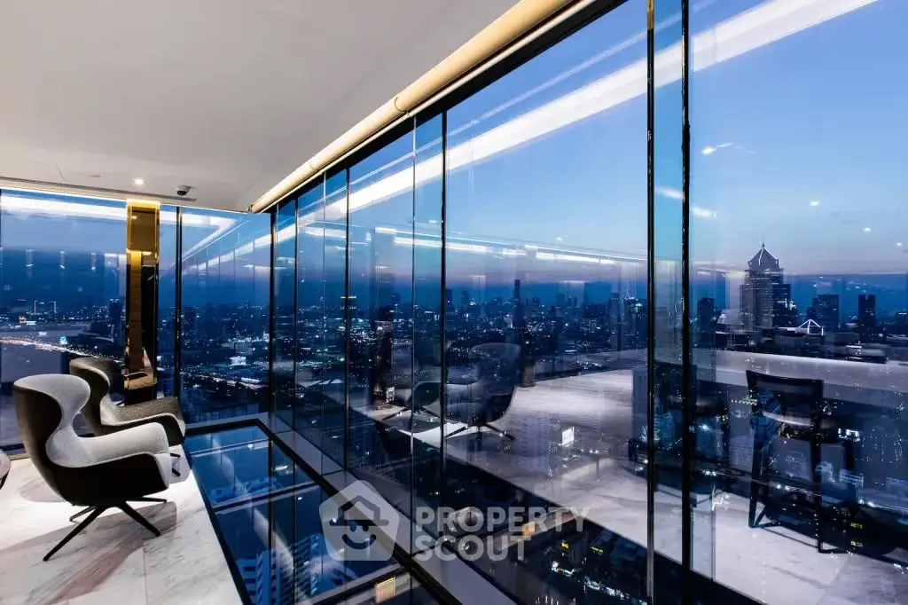 Luxurious high-rise apartment with stunning panoramic city views and modern interior design.