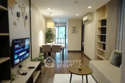 Modern living room with dining area and stylish decor in a cozy apartment