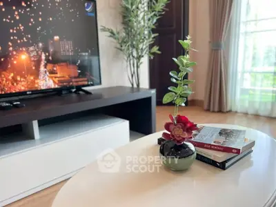 Stylish living room with modern TV setup and elegant decor