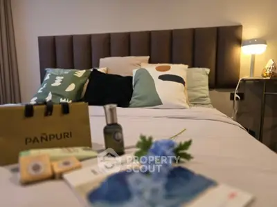 Stylish bedroom with modern decor and cozy lighting, perfect for relaxation.