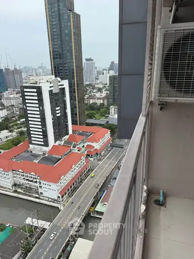 Stunning high-rise balcony view overlooking cityscape and modern architecture.