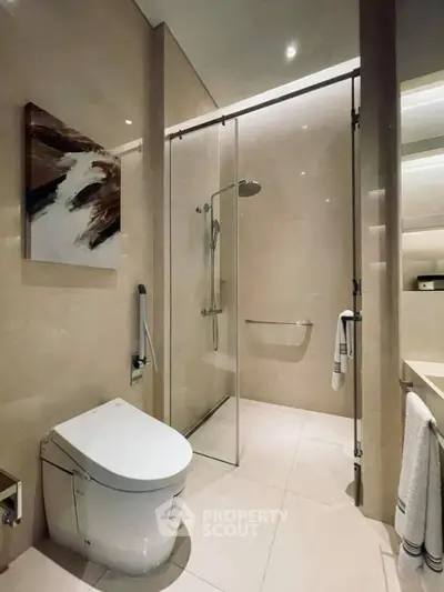Luxurious modern bathroom with sleek shower and elegant decor