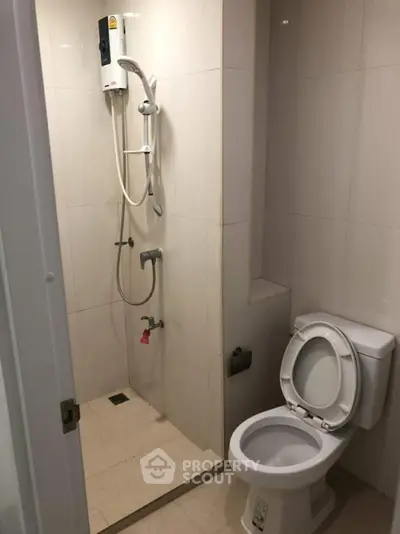 Modern bathroom with shower and toilet in sleek design