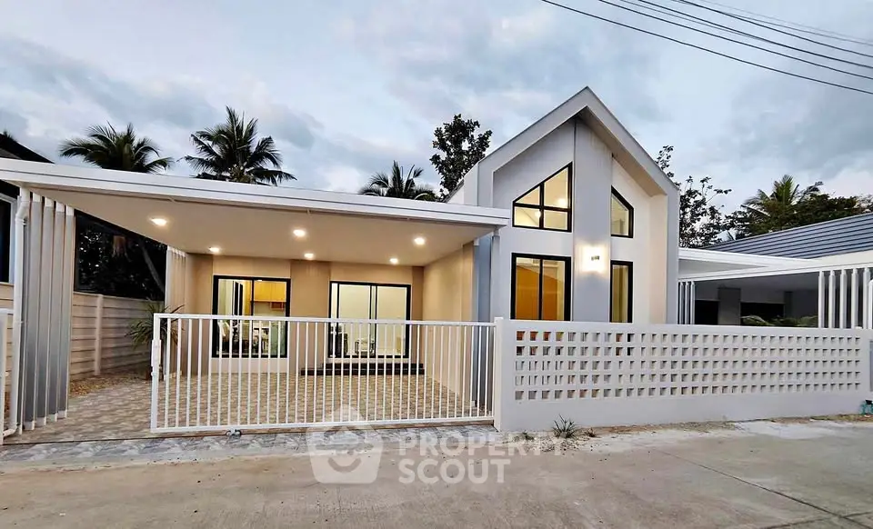 Modern single-story house with sleek design and large windows, perfect for contemporary living.