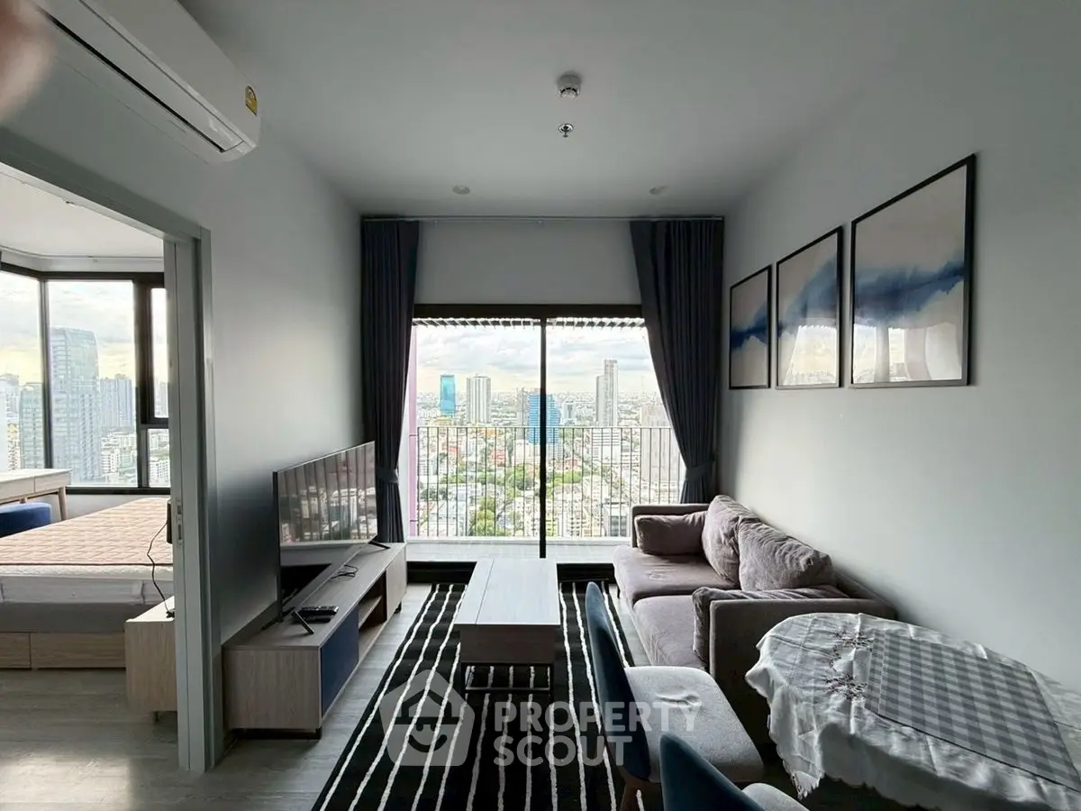 Modern living room with stunning city view and stylish decor