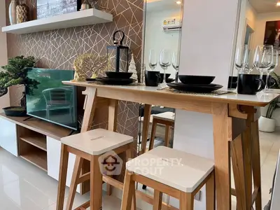 Stylish modern living room with elegant decor and dining setup