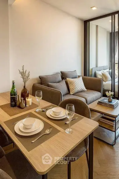 Modern living room with elegant dining area and cozy sofa