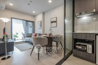Modern open-plan living room with elegant dining area and stylish decor