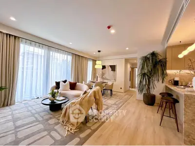 Spacious modern living room with elegant decor and natural light