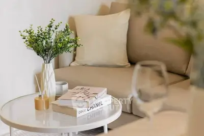 Elegant living room with cozy beige sofa and stylish coffee table decor