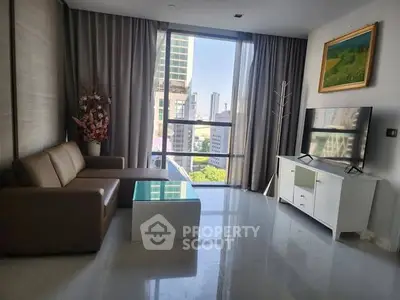 Modern living room with city view, sleek furniture, and large windows.