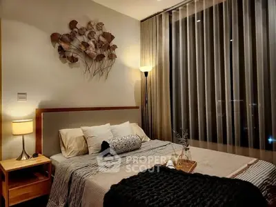 Cozy bedroom with modern decor and large window offering city view