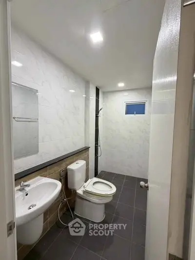 Modern bathroom with sleek fixtures and elegant tile design