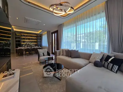 Luxurious modern living room with elegant decor and spacious seating area, perfect for relaxation and entertainment.