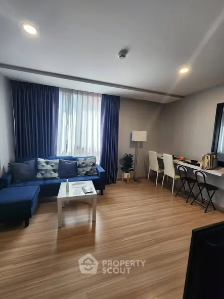 Modern living room with stylish decor and cozy seating area