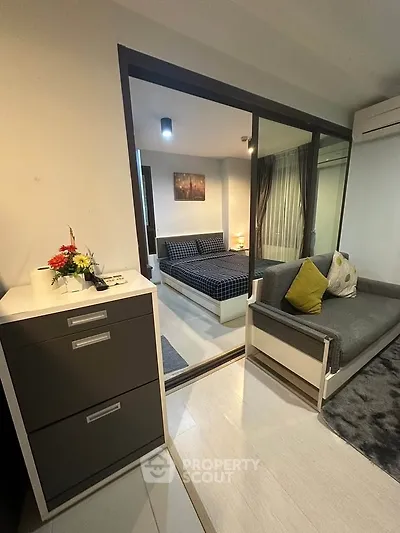 Modern apartment with cozy bedroom and stylish living area