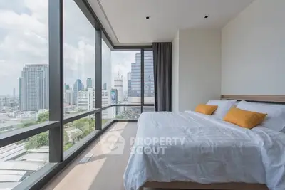 Luxurious bedroom with panoramic city view and modern design