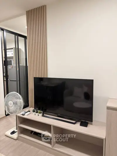 Modern living room with sleek TV stand and stylish decor