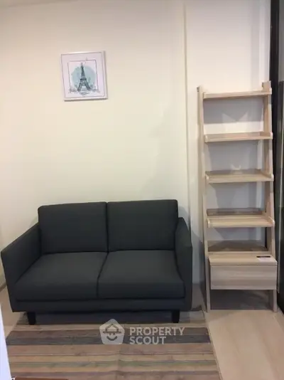 Cozy living room with modern sofa and stylish wooden shelf unit