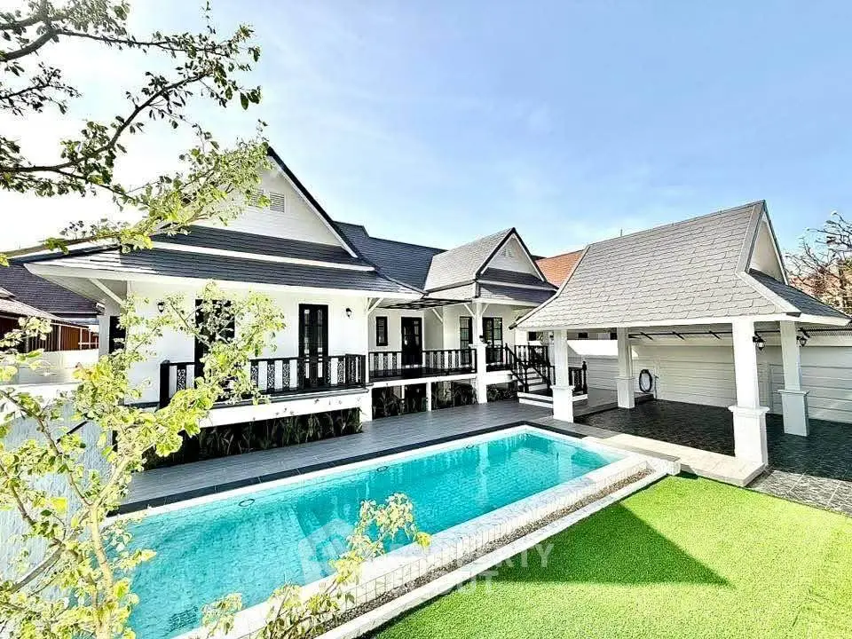 Luxurious modern house with private pool and lush garden, perfect for family living.