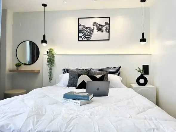 Modern bedroom with stylish decor and cozy ambiance