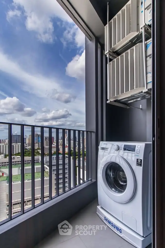 Modern balcony with washing machine and city view, perfect for urban living.