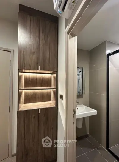 Modern bathroom with sleek cabinetry and stylish sink area