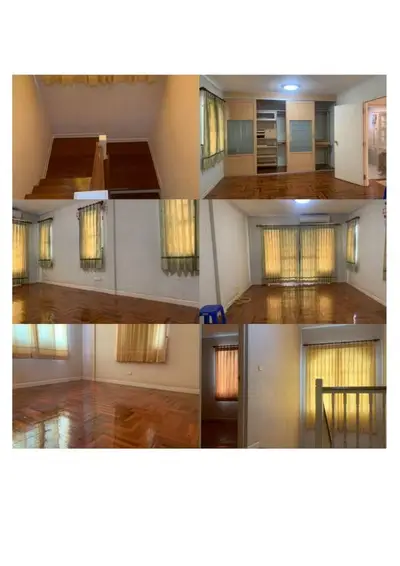 Spacious interior with wooden floors and large windows, perfect for natural light lovers.