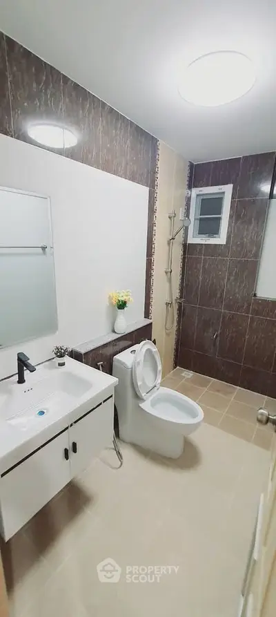 Modern bathroom with sleek fixtures and elegant tile design