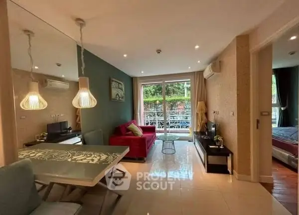 Stylish living room with modern decor and balcony view