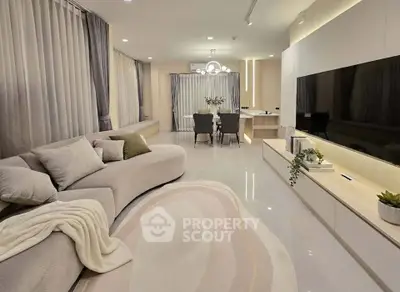 Luxurious modern living room with elegant decor and spacious layout