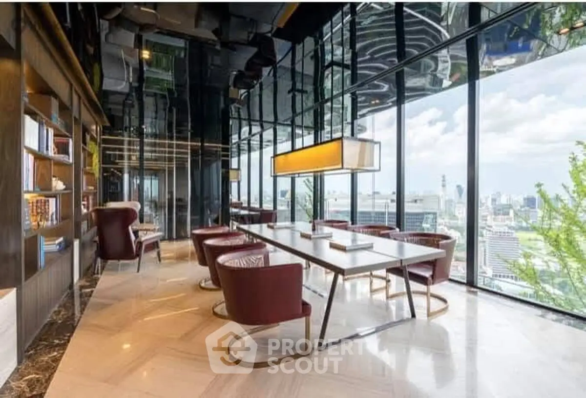 Luxurious modern living room with panoramic city view and elegant furnishings.