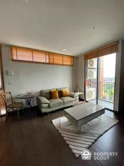 Modern living room with balcony and stylish decor