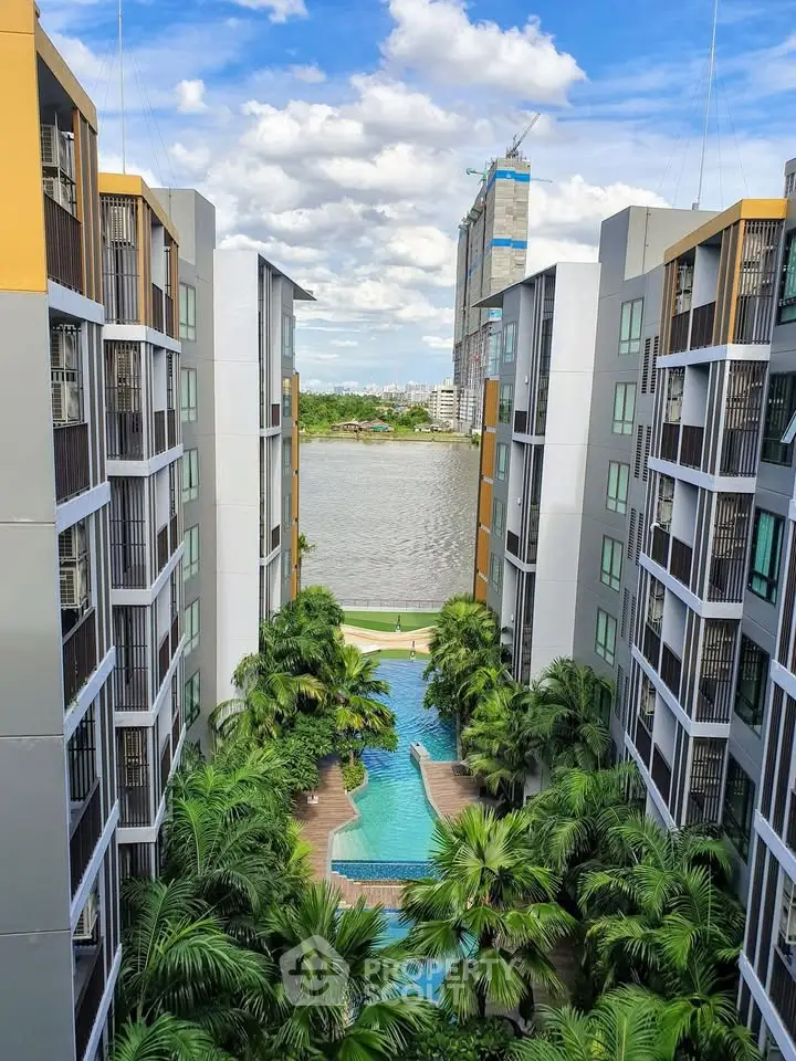 Stunning modern apartment complex with pool and river view